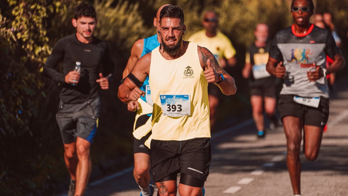 Athletes competing in an exhilarating marathon on a sunny day, showcasing determination and vigor.